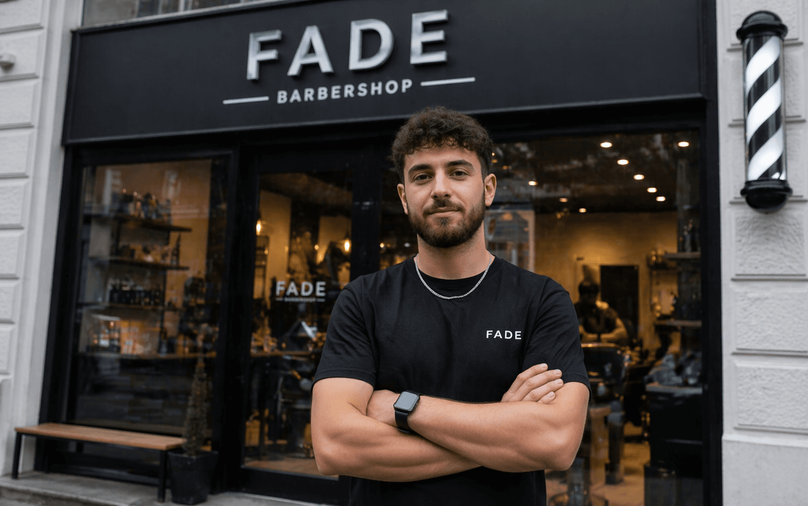 Fade barbershop storefront; team at the entrance